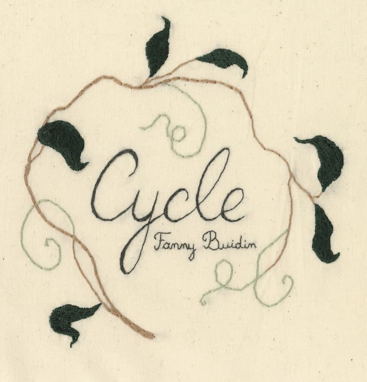 Broderie présente sur la couverture du livre "Cycle"